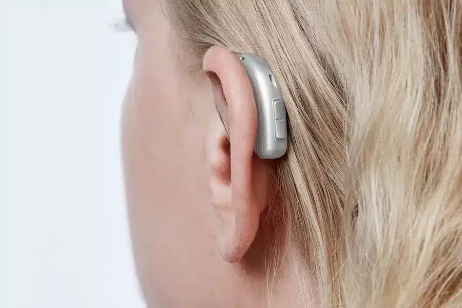 Oticon More miniRITE T C091SilverGrey AngleB45 Close up In On Ear MS 6662 Woman 1200x800px Original file