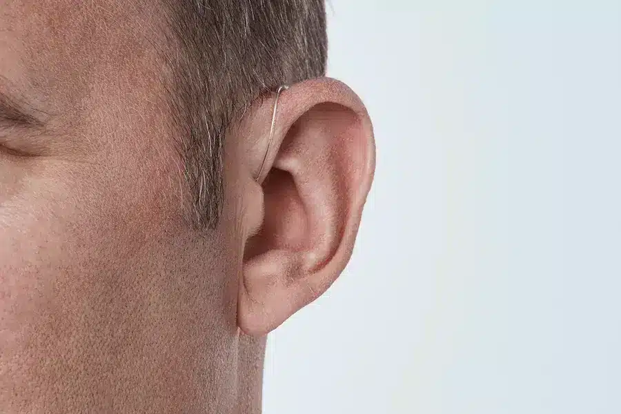 Oticon More miniRITE T C091SilverGrey AngleF45 Close up In On Ear MS 6890 Man 1200x800px Original file